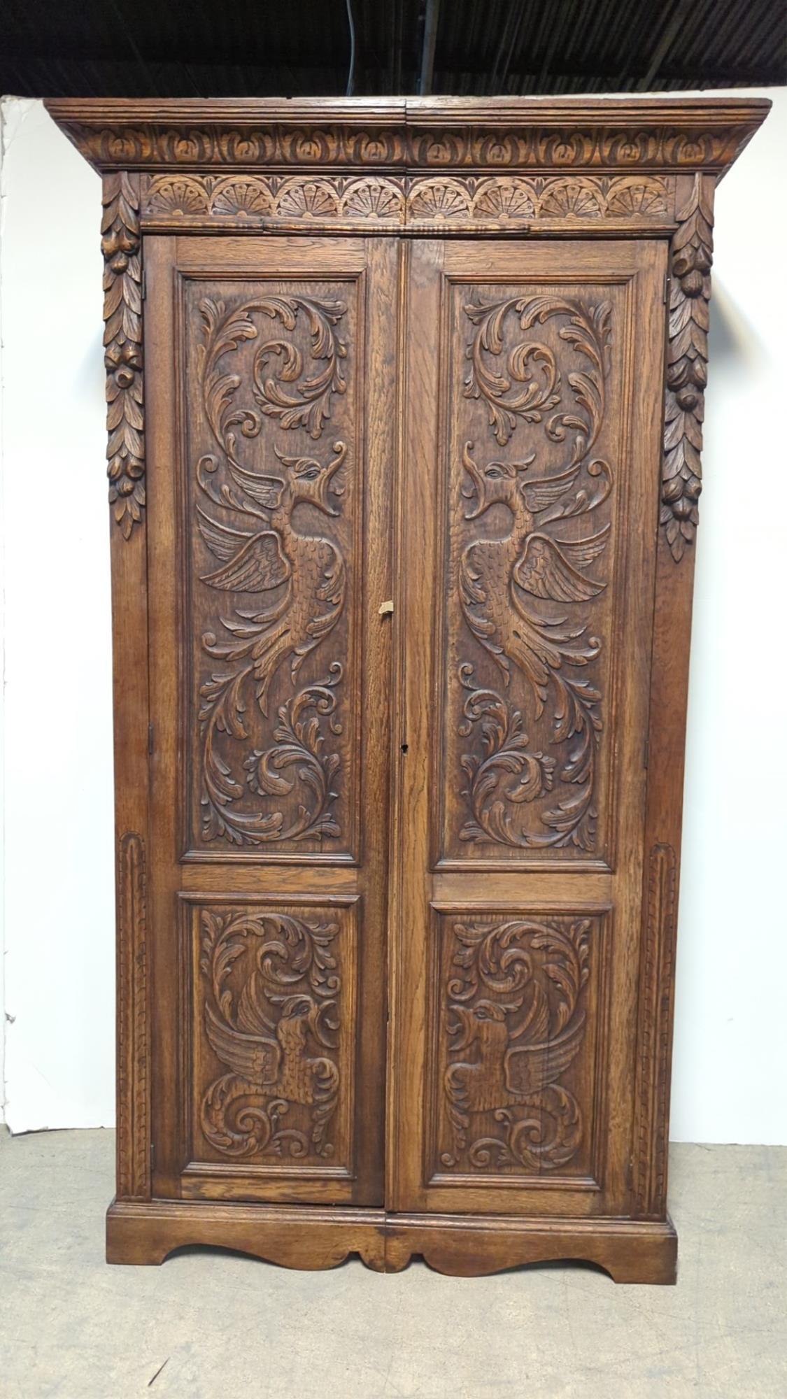 Antique oak dragon carved design 2 door armoire (1 of 5)