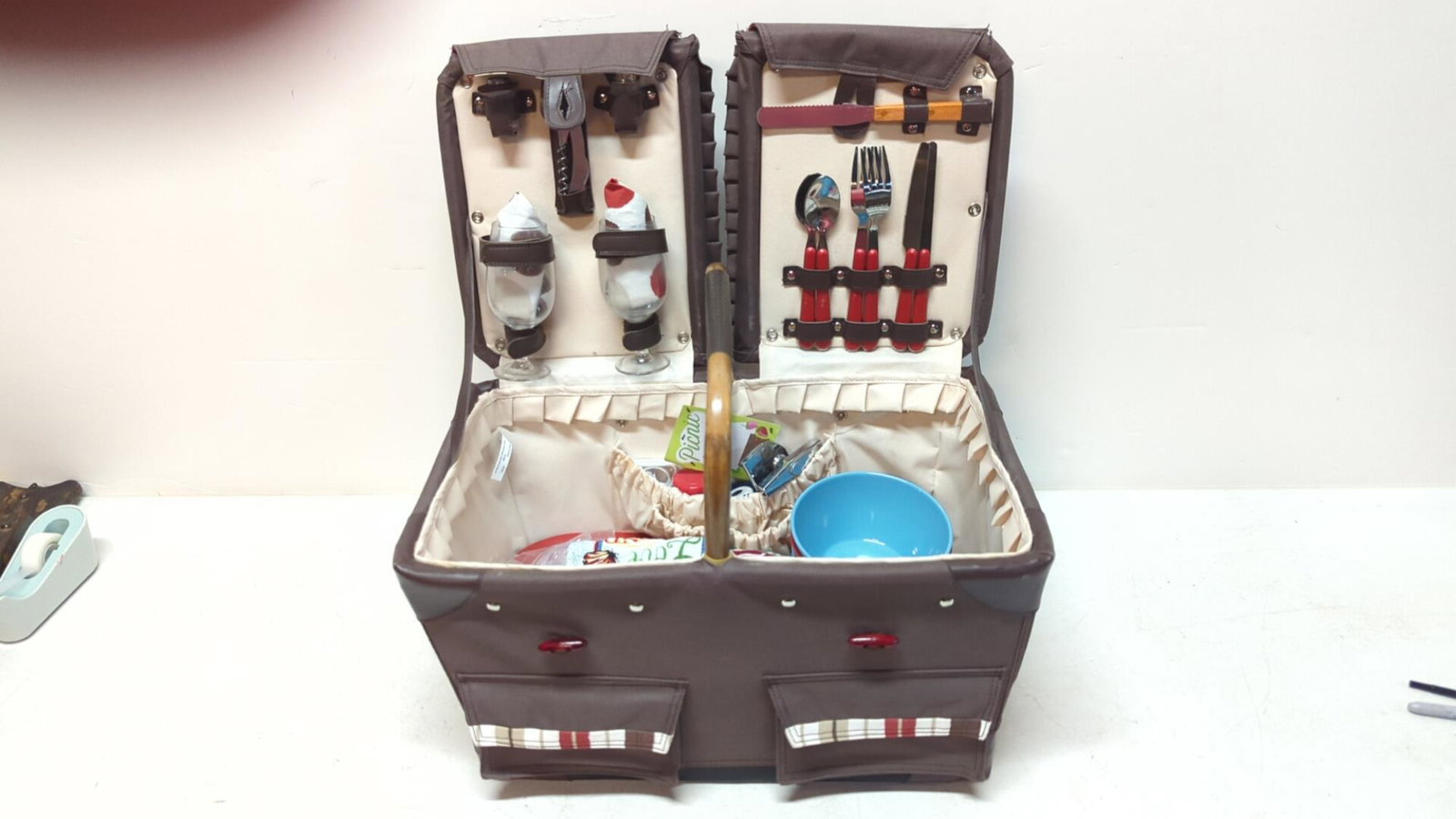 Picnic Basket with contents: plates, bowls, glasses, flatware, wine and can opener, S & P shakers & Blanket