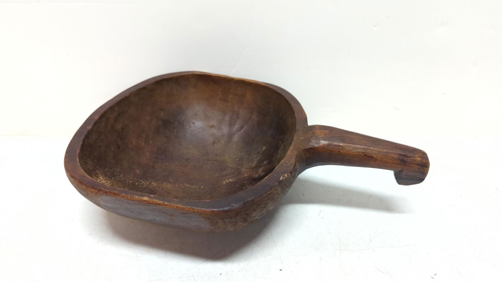 Primitive deep wooden scoop with handle (1 of 2)