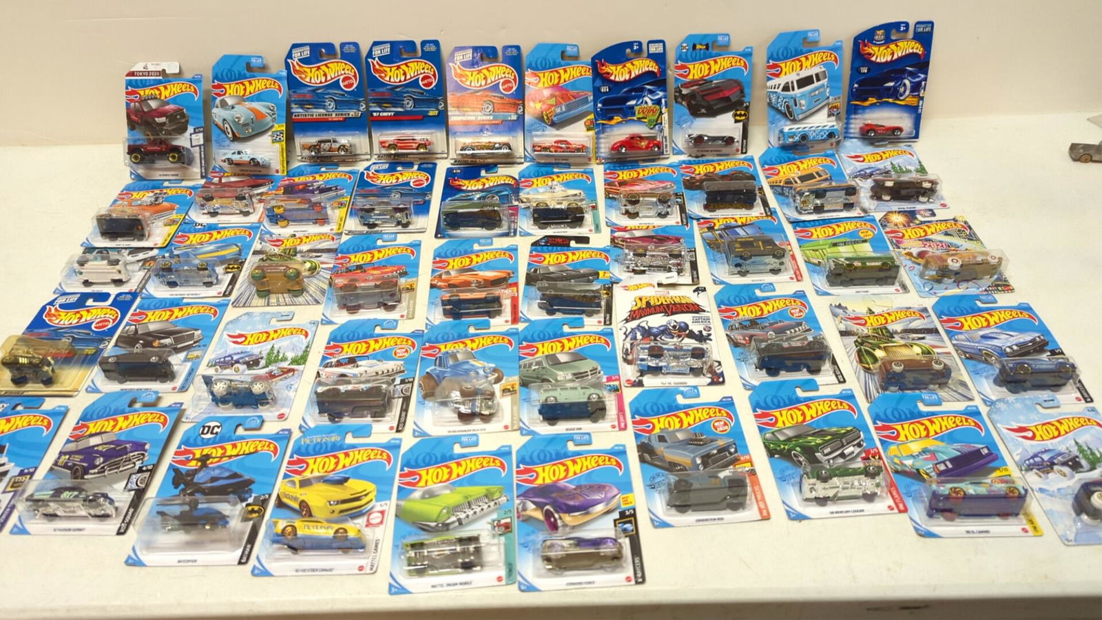 50 assorted Hot Wheels toy cars: Misc. yearand models