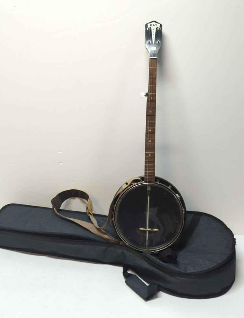 Kay 5 String Banjo with soft case: Banjo has some wear on backside neck and head missing one string comes with 2 full packs of strings gibson and D'Addario