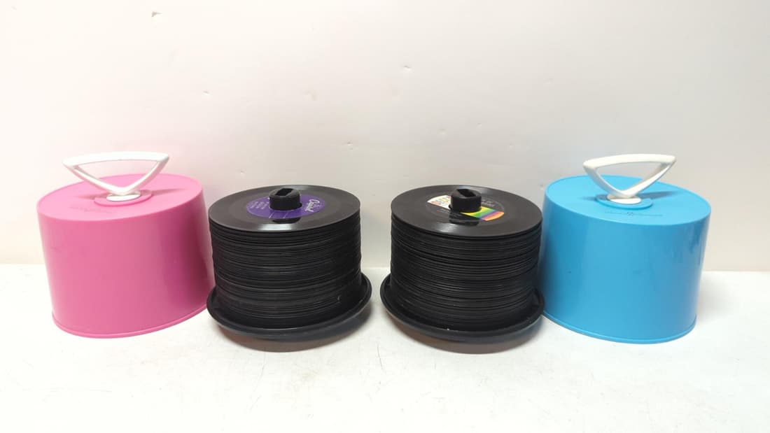 (2) mid century 45 rpm records and Disk -Go-cases (1 of 2)