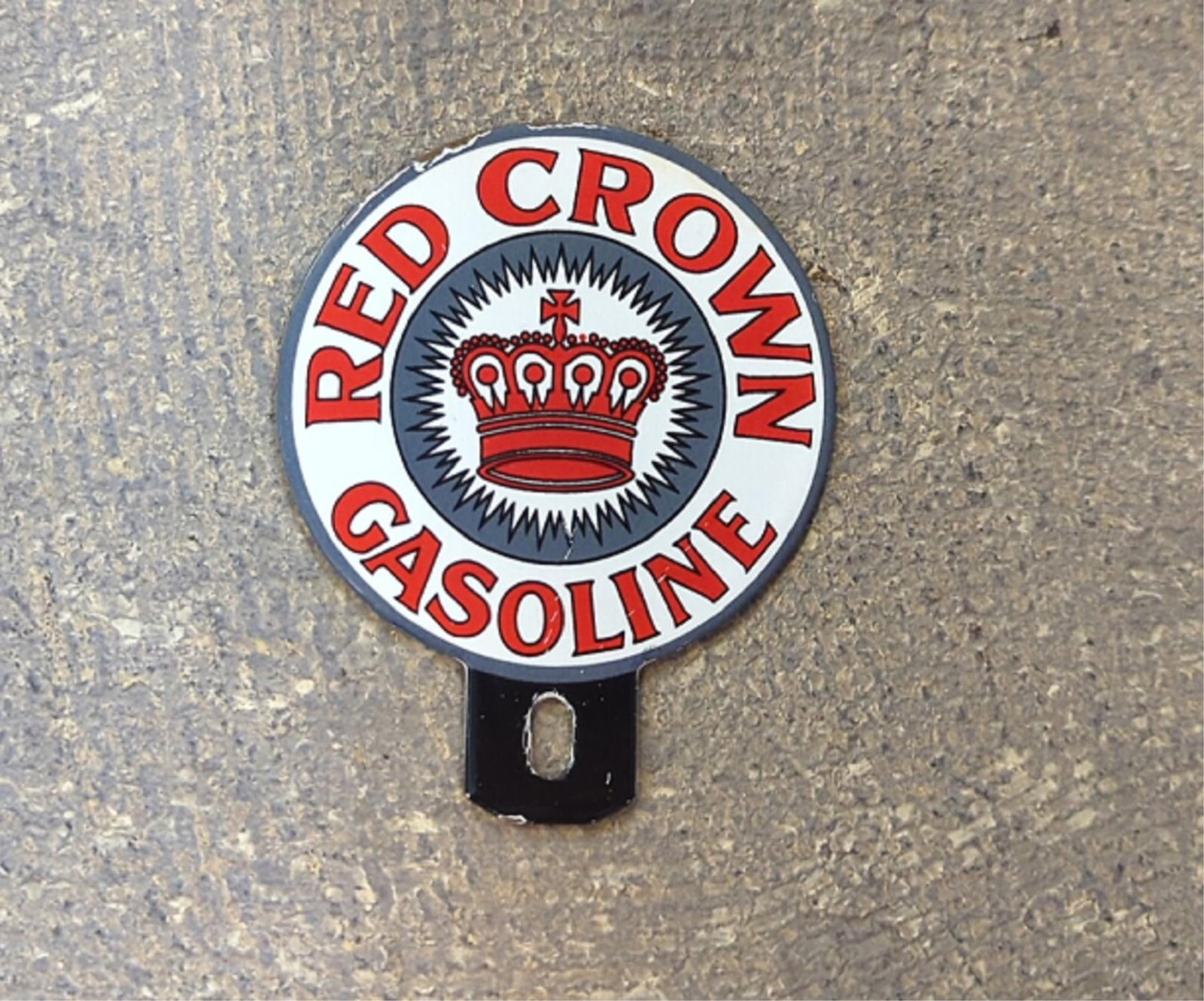 Red Crown Porcelain Tag Topper: 4 7/8" T x 3 7/8" W some dings and rust to perimeter and interior