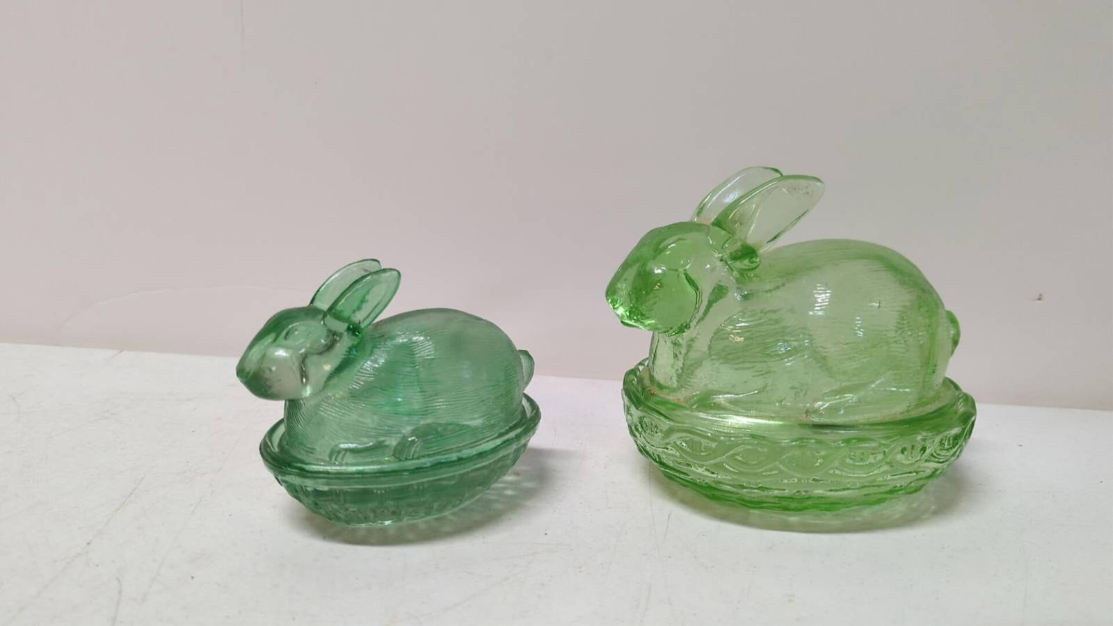 (2) Green Rabbits On A Nest Auction