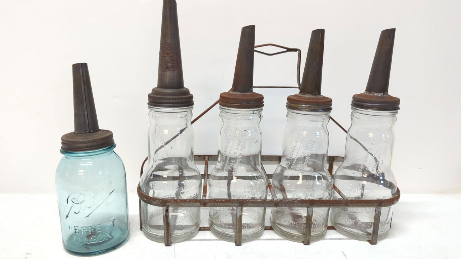 5 Vintage Oil Bottles and Metal Carrier (1 of 3)