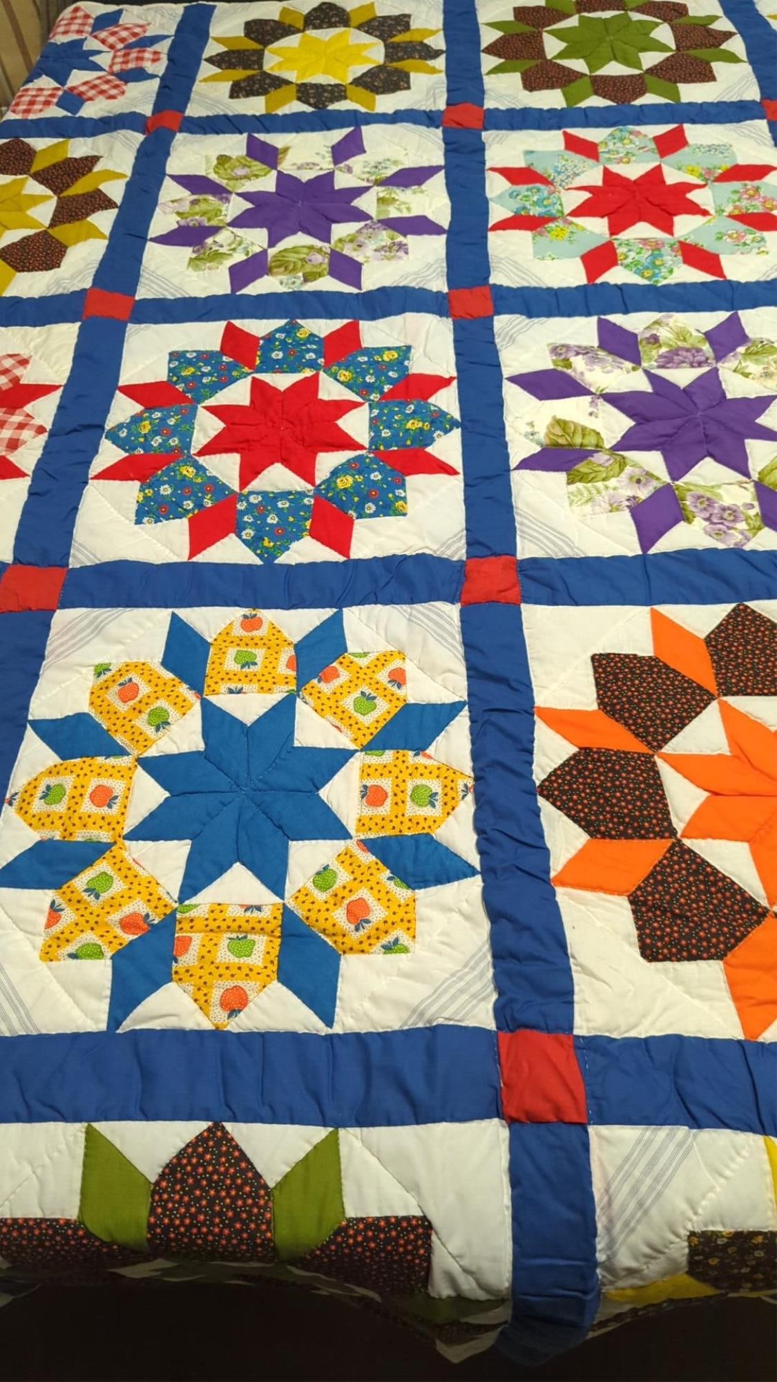 Star Quilt Polyester: Hand quilted and machine pieced 95 " x 76"