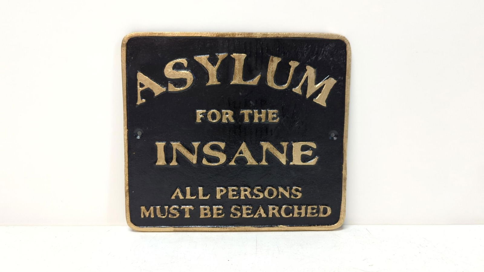 Asylum for the Insane cast iron sign (1 of 2)