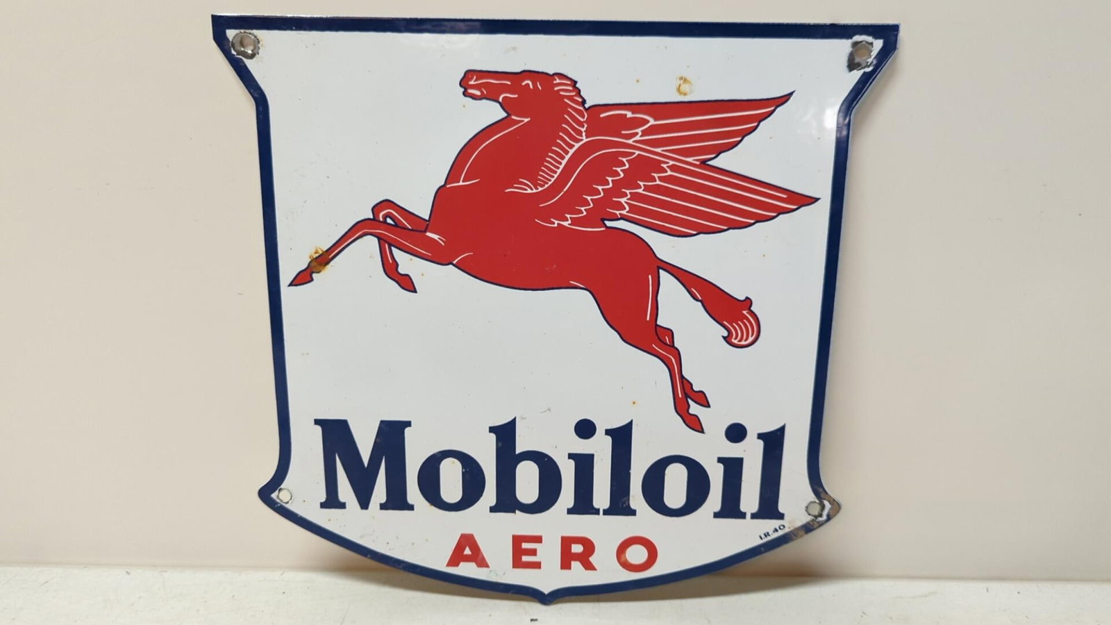 Porcelain Mobil Oil Aero Peagasus shield sign: dings at mounting holes