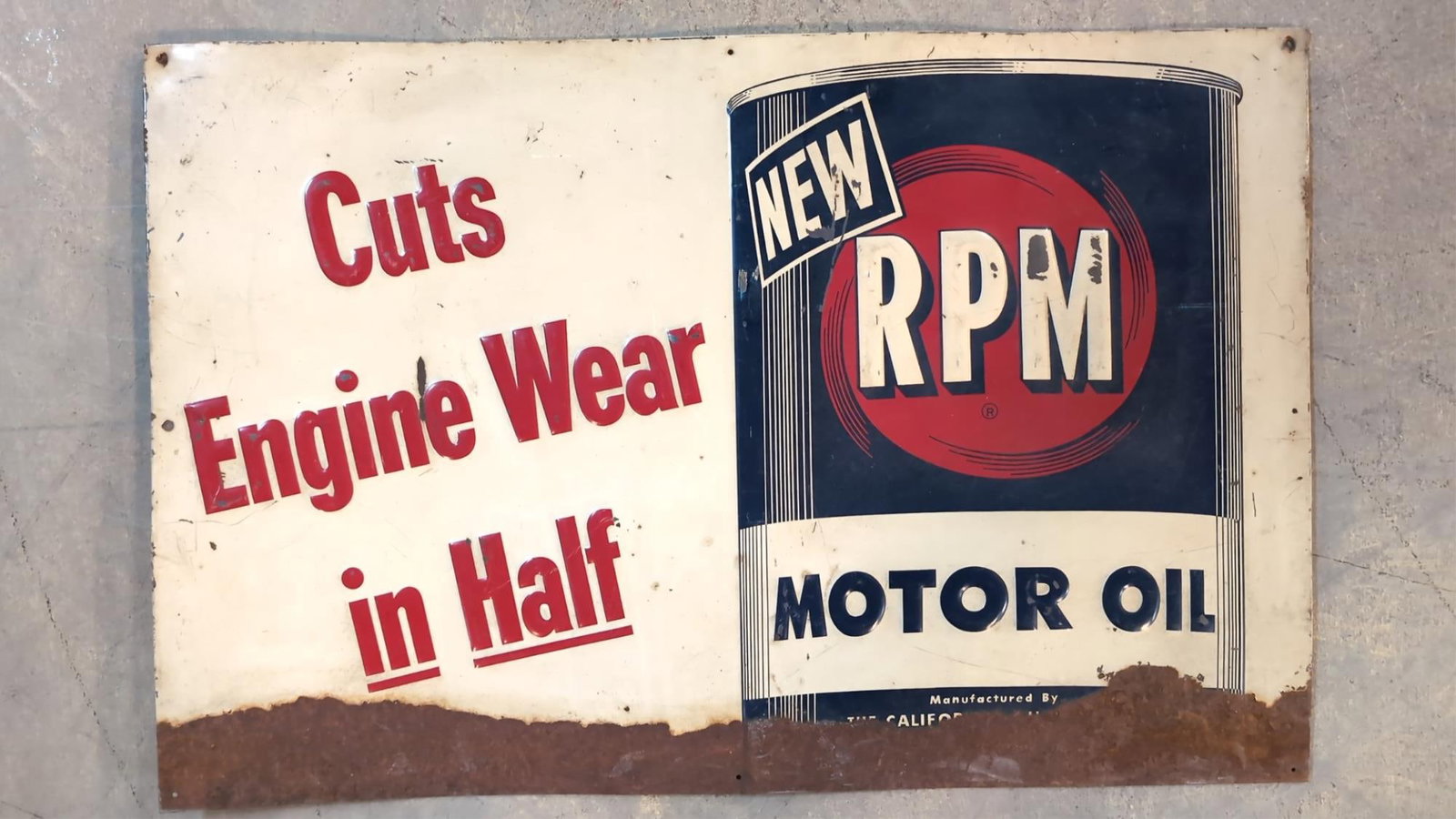 Embossed metal R.P.M. Motor Oil single sided sign: 35 1/4" W x 23 1/4" T Rust and corrosiion across bottom edge 3 to 4 inches up