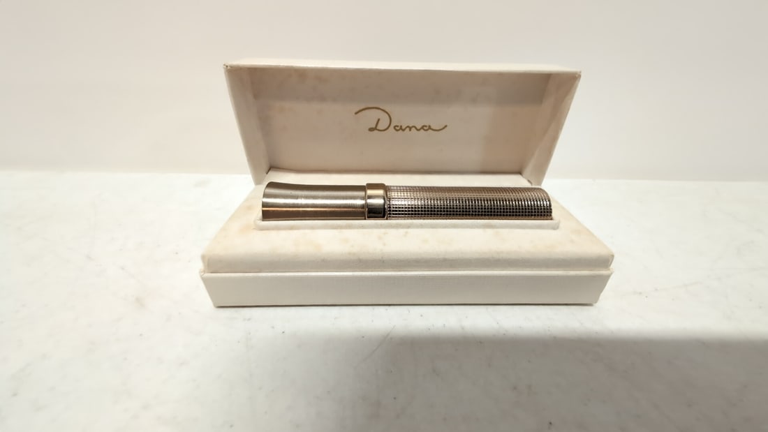 Vintage Dana Refillable Perfume holder: Gold Tone Directions included in original box 4" long