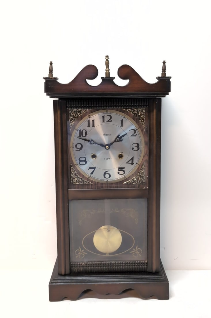 Alaron 31 Day Key Wind Clock: Running with key and pendulum 24" t x 12 1/4" w x 5" d