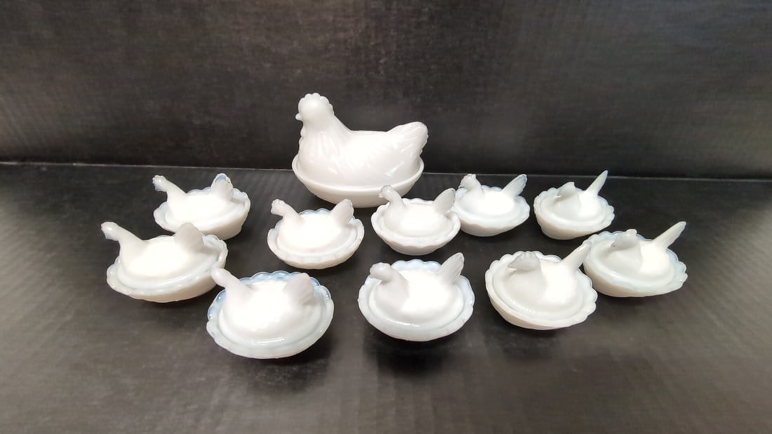 (11) Hen on Nest: (1) Mommy Hen 4 1/4" L and (10) Babies 2 3/8" L Babies are marked Anchor Hocking inside