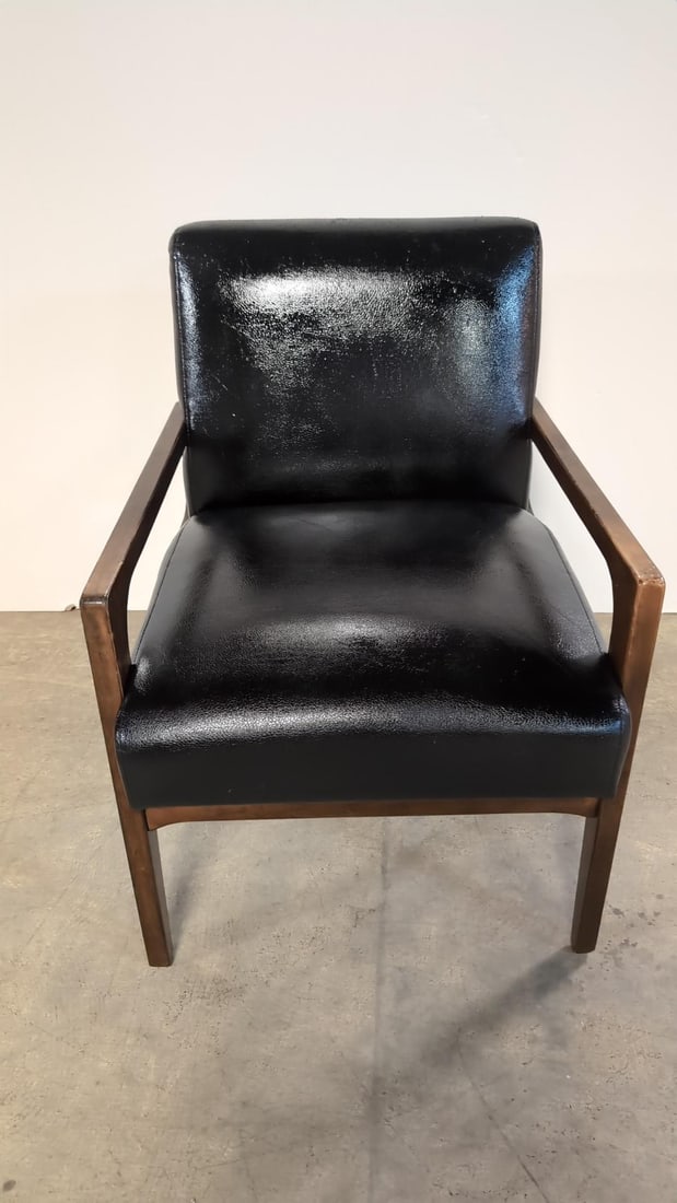 Mid Century Style Occasional Chair: Black bonded vinyl 30" T x 31" D x 21 1/2" W