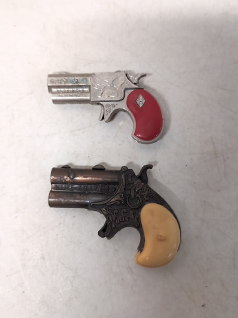 1960s Hublley and Hide-A-Way Derringers cap guns: hubley 3" L Hide-A-Way 3 1/2" L both in good used condition