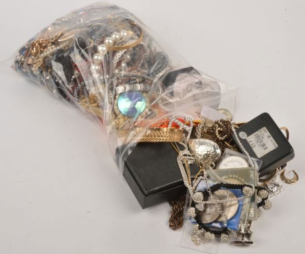 A quantity of costume jewellery, including; simula: A quantity of costume jewellery, including; simulated pearls; chains; bracelets; bangles; some items on point of sale display; a Met Police 150th annivesary medal; a bottle of J'adore perfume; and a a