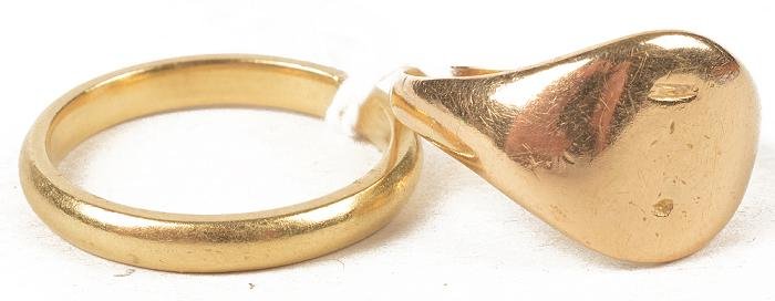 An 18 carat gold wedding band, Birmingham, finger: An 18 carat gold wedding band, Birmingham, finger size P; and a signet ring, finger size O, 9.7g gross IMPORTANT: This lot is subject to VAT and the buyer must pay VAT on both the hammer and the buyer