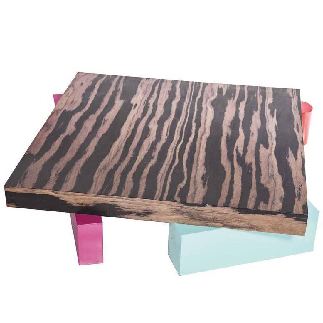 E. Sottsass, Coffee Table in Laminated Wood, Alessi: A beautiful coffee table in laminated wood designed by Ettore Sottsass for Alessi, circa 1990. DIMENSIONS 11.81 in.Hx55.12 in.Wx53.15 in.D 30 cmHx140 cmWx135 cmD