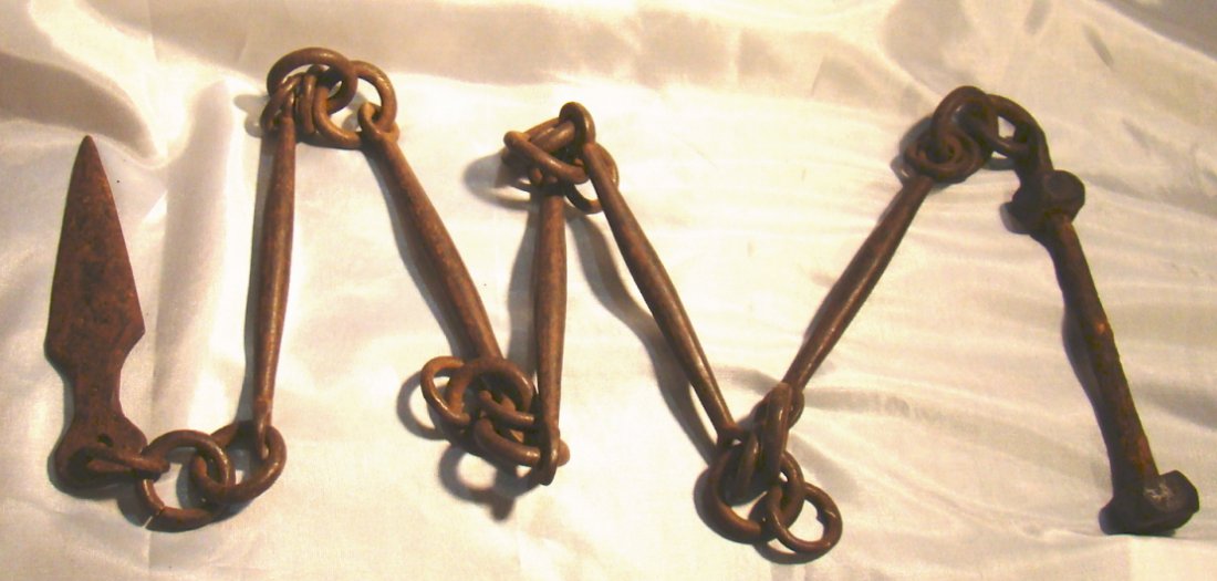 Antique Chinese Iron Whip: Antique Chinese Iron Whip, c. 18th or 19th Century. This is a martial arts type concealed weapon frequently associated with bodyguards. Six links whit handle and knife point tip. Items may be picked u