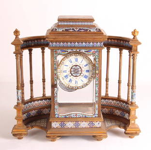 Tiffany and Company Cloisonne Clock Case Only: Tiffany and Company cloisonne and brass clock case, with enamel dial and mercury pendulum, measuring 17 by 17 by 6.5 inches.