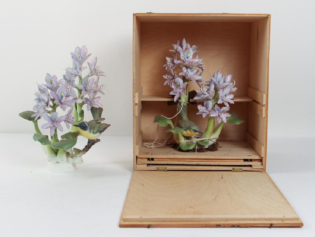 Dorothy Doughty Yellow Throats by Royal Worcester: Doughty, Dorothy (1892-1962). A pair of porcelain Yellow Throats, male and female, they are nestled in lilac hued Water Hyacinth. Modeled by Dorothy Doughty for her American Birds series, and produced