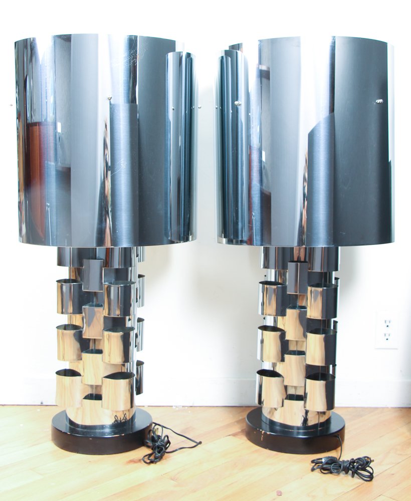 Pair of Curtis Jere Chrome Lamps: Pair Mid-Century Curtis Jere Chrome Plated Table Lamps on painted wood base, 38.5 inches tall, lamps have an interior light in lamp centers, with attached Jere labels to wood base