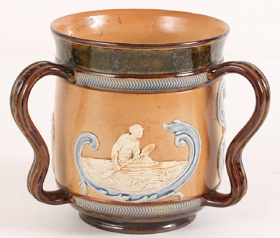 A Doulton Lambeth stoneware tyg featuring rowing (1 of 3)