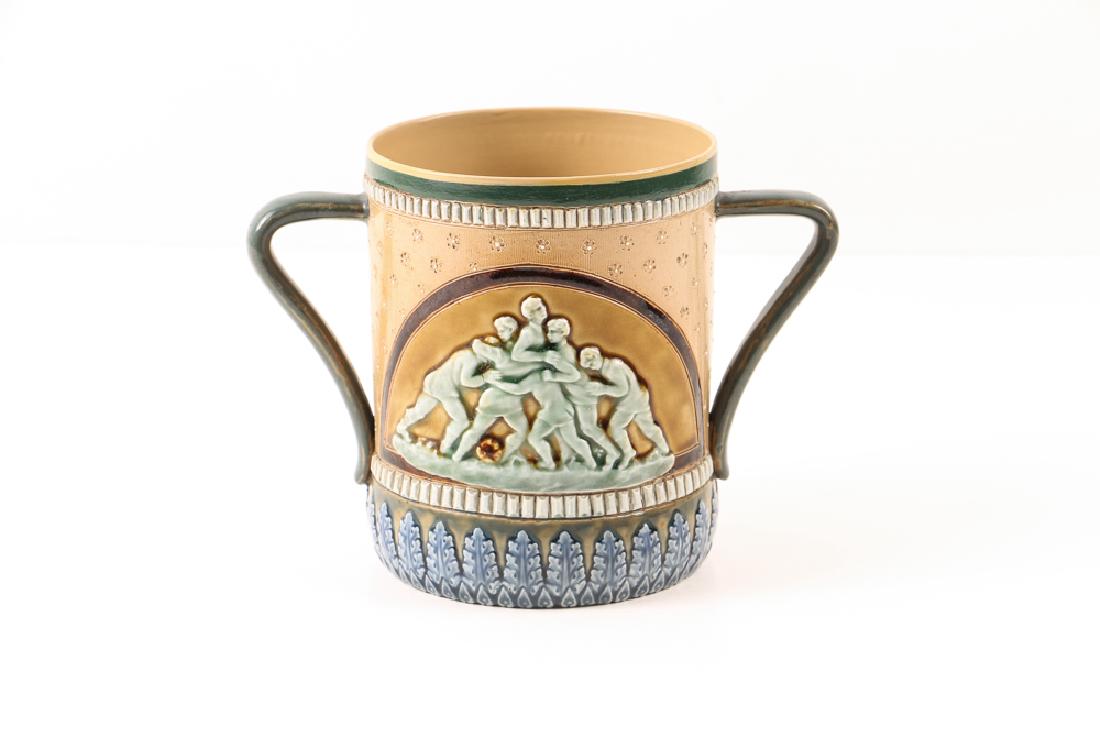 A Doulton Lambeth stoneware Rugby Mug , 1883 (1 of 9)