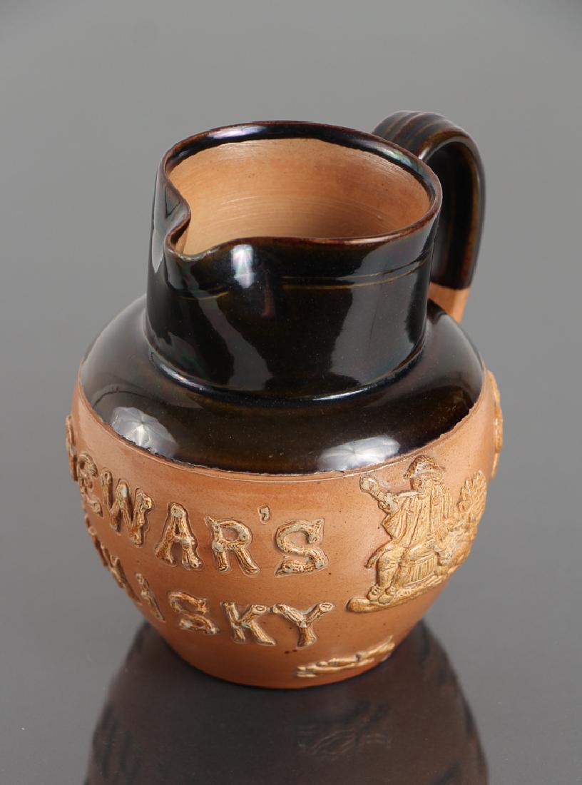 Three Doulton Lambeth stoneware liquor jugs (1 of 11)