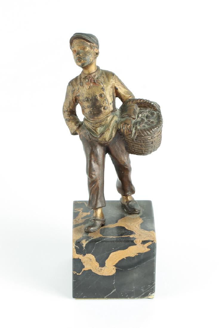 Cast Metal Statuette of Whistling Boy with Basket (1 of 6)