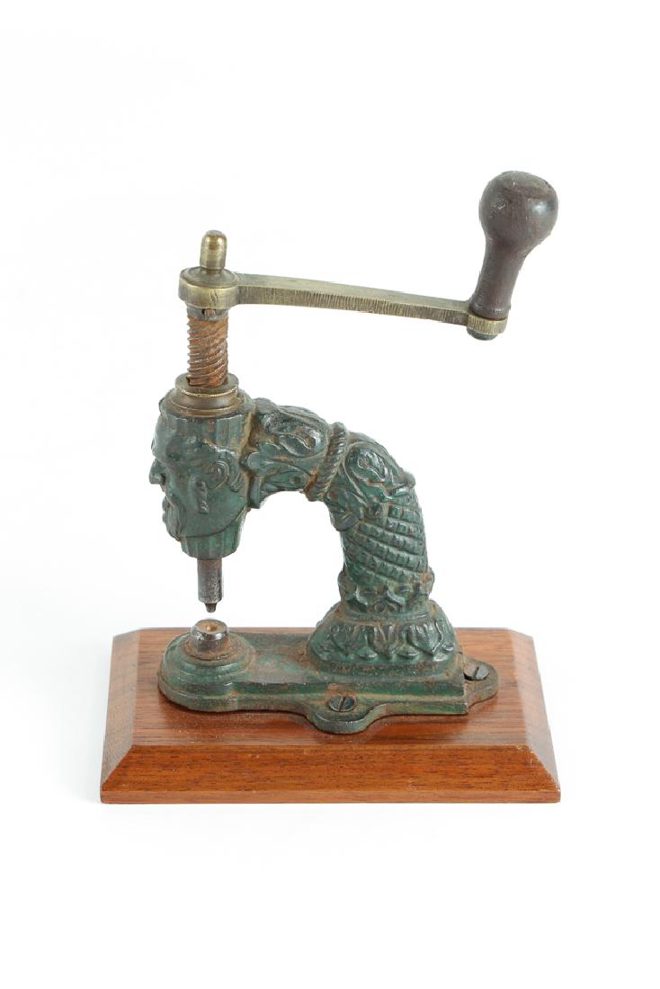 Cast Iron Figural Hole Punch (1 of 6)