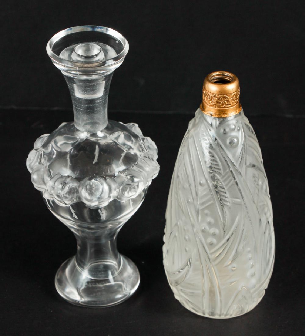Pair of Perfume Bottles, Including Lalique Rose: Lalique France and Devil Bliss, pair of perfume bottles, including: rose and foliate patterns, glass (crystal), undersides with makers marks for Lalique France and Devil Bliss respectively, circa 20th
