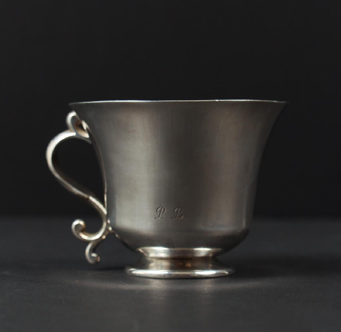 Early Silver Cup with C Scroll Handle: Early silver cup with "s" scroll handle, approximately 3 inches, approximately 3 troy ounces.