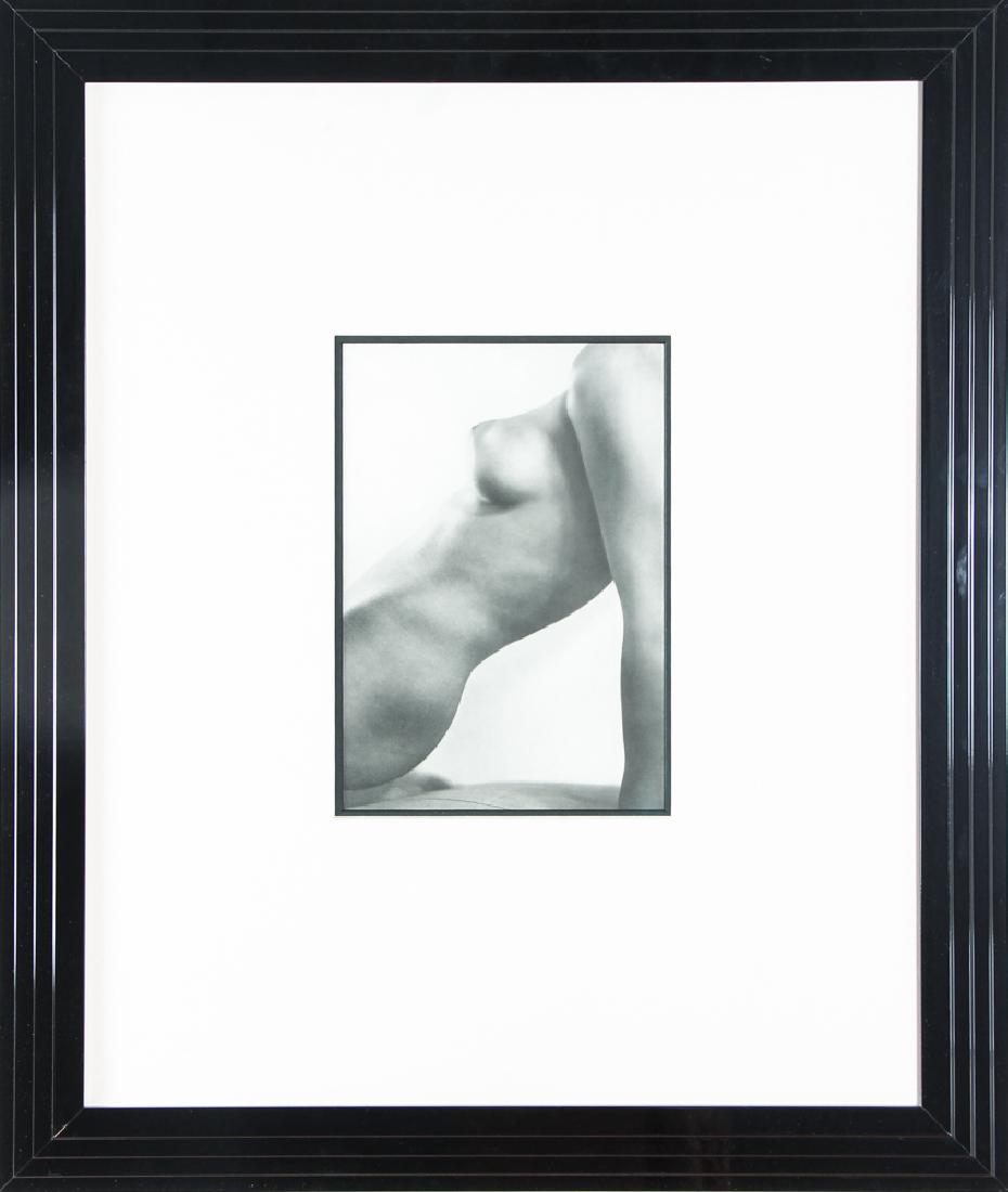 John Everard Female Nude Photograph: Everard, John (British, 20th century) photograph, showing a reclining female nude, measuring 11 by 8 inches, in a black frame measuring 29 by 24 inches.