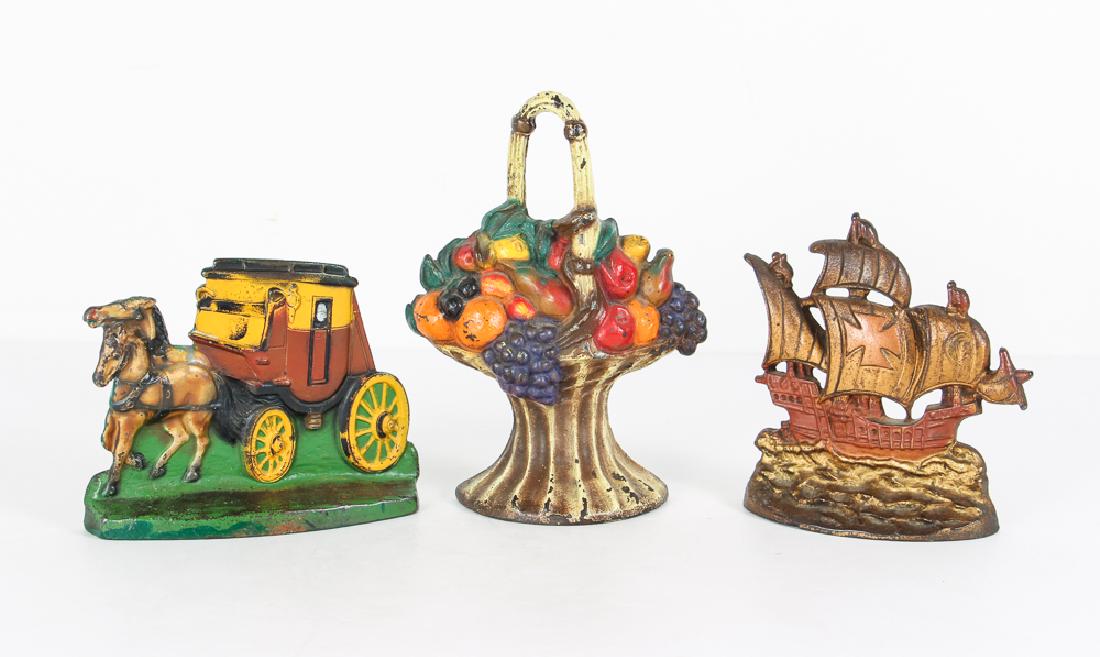 Three Miscellaneous Cast Iron Doorstops (1 of 4)