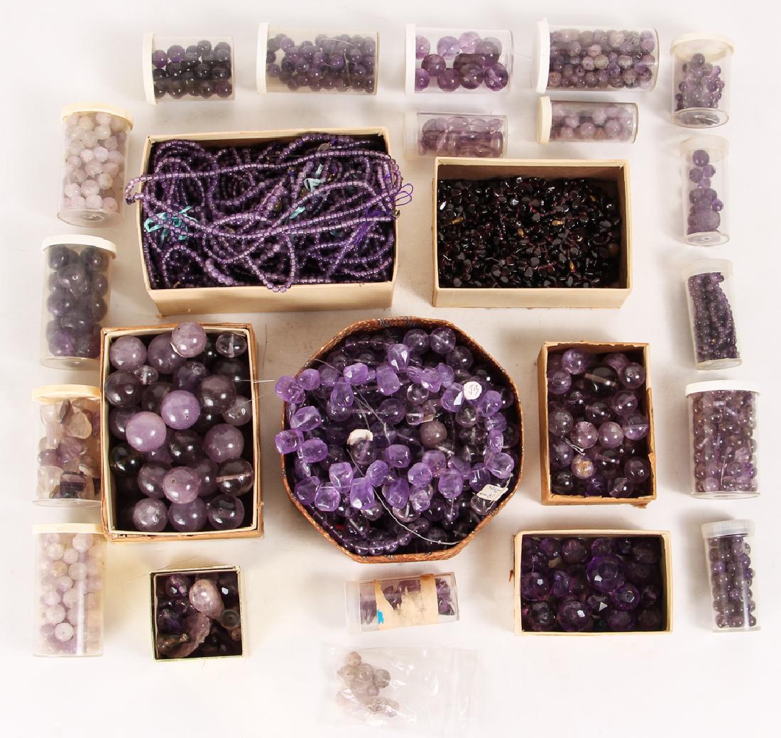 Large Group of Amethyst and Related Beads: Large group of amethyst and related beads, some carved, ranging in size from 1/8 to 1 inch. Provenance: Collection of Ruth Frank.