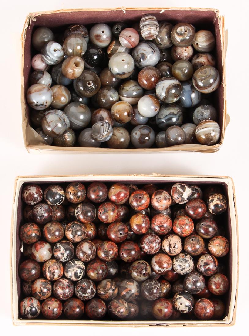 Group of Agate and Related Beads: Group of agate and related round beads, all approximately 1/2 to 3/4 inches. Provenance: Collection of Ruth Frank.
