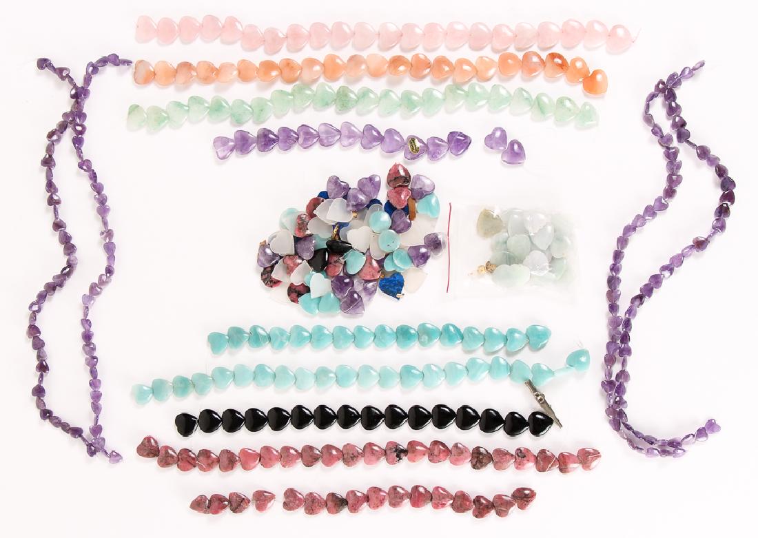 Group of Heart Shaped Mineral Beads: Group of heart shaped mineral beads, ranging in size from 1/2 to 3/4 inch. Provenance: Collection of Ruth Frank.