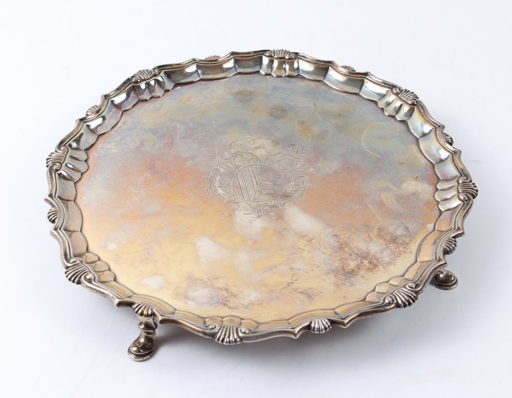 Georgian Sterling Silver Salver: Salver, sterling silver, Georgian period by Robert Abercrombie and dated 1744, with an engraved crest on the center, and the initials W I A on the reverse, measuring 11 inches, approximately 26 troy o