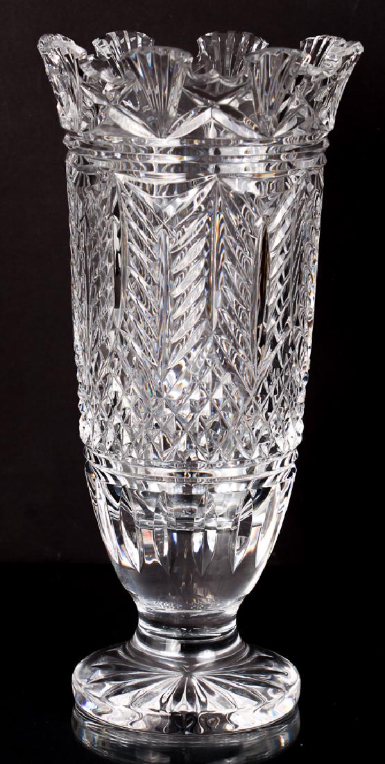 Waterford Cut Glass Vase: Waterford cut glass vase. Diamond and feather design. The lip of the vase is cut with a fan and scallop lip. The vase is 11" tall, 5 1/2" wide at the lip.