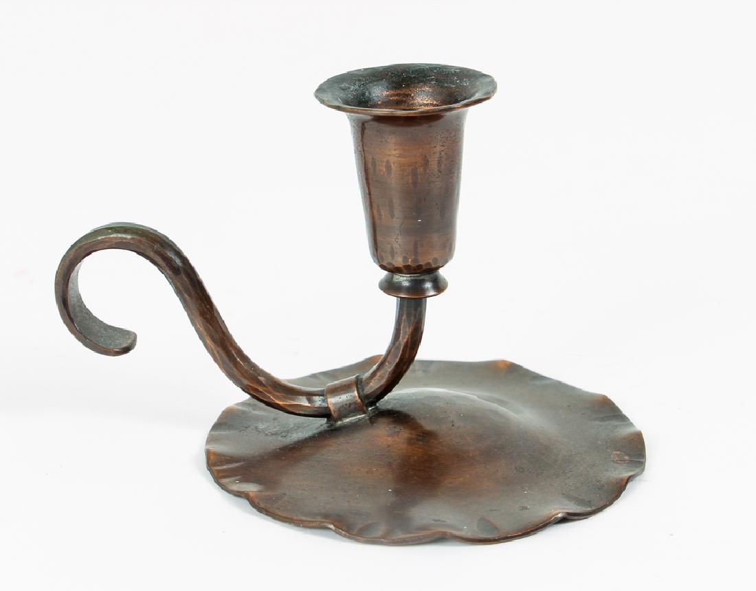 Copper Arts and Crafts Chamberstick: Copper Arts and Crafts chamberstick. Made by the Avon copper company for Roycroft. Impressed on the bottom "THE AVON COPPER SMITH". Measures 3 1/2" tall, base 3 3/4" diameter. Circa:1920.