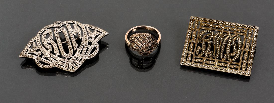 Three Pieces of Vintage Marcasite Jewelry: Three pieces of vintage marcasite jewelry, two pins with initials and a ring. Provenance: collection of Ruth O. Frank.