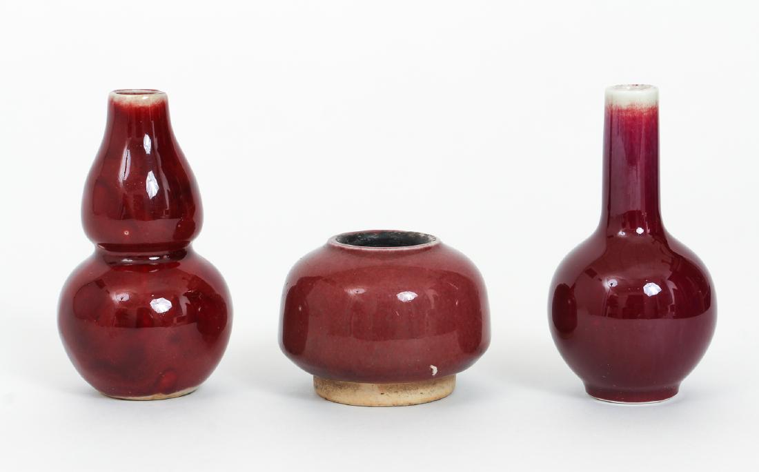 Three Antique Chinese Sang de Bouef Vases: Three antique Chinese Sang de Bouef vases, miniature forms, tallest 4 inches.