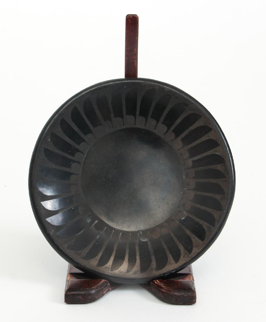 Santana & Adam Martinez Blackware Plate: Santana (Santana Martinez, 1909-2002) and Adam (Adam Martinez ,1903-2000), San Ildefonso Blackware Plate, feather pattern. Signed Santana/Adam on underside, Diameter: 6 inches, Provenance: Patricia Le