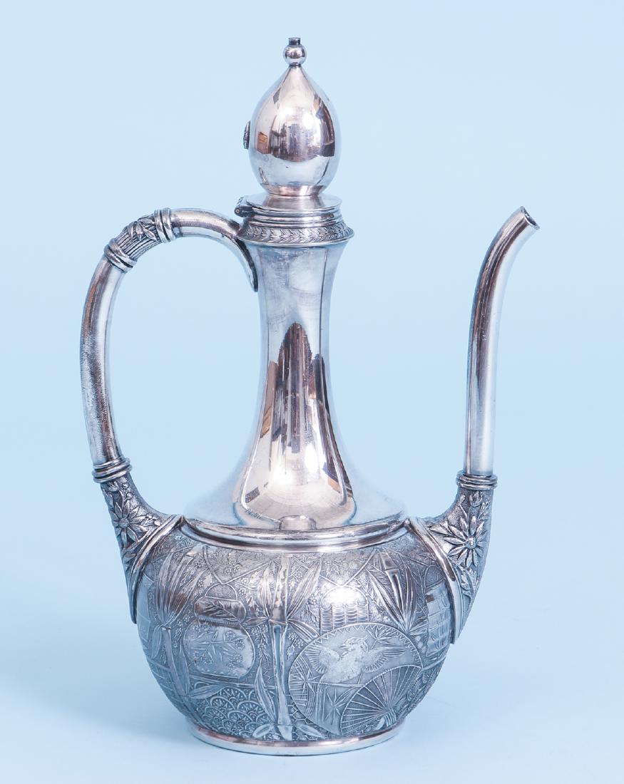Pairpoint Silver Plate Arabesque Inspired Coffee Pot: Pairpoint silver plate arabesque inspired coffee pot, measuring 11 by 7 inches.