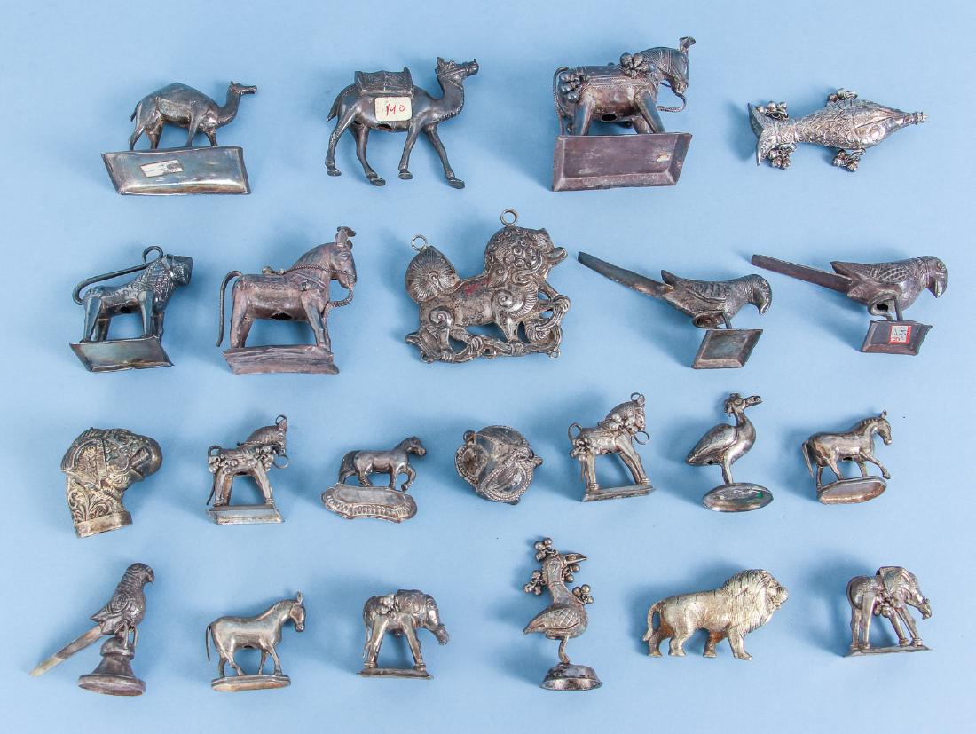 Twenty Two Antique Chinese Silver Animals: Twenty two antique Chinese silver animals, various grades of silver from plate to sterling likely to be found, measuring 1.5 inches to 3.5 inches. Provenance: collection of Ruth O. Frank.