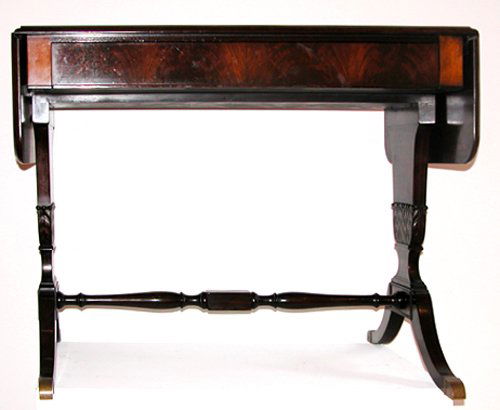Duncan Phyfe style mahogany sofa table: Artist: Title: Duncan Phyfe style mahogany sofa table with carved base and flared legs joined by turned stretcher Medium: mahogany Dimensions: 30.5 x 36 x 23 inches (with leaves down, each leaf 10 in