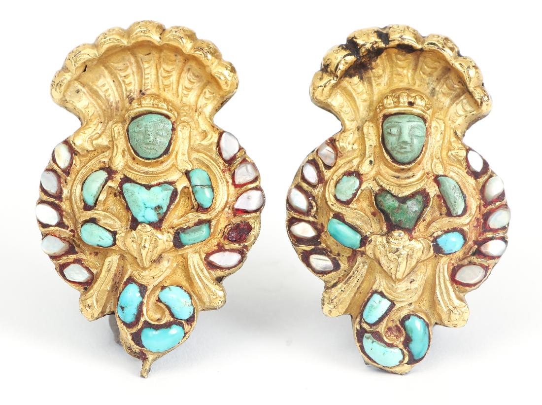 Pair Pre Columbian Style Buckles: Pair of Pre Columbian style buckles, set with turquoise and mother of pearl, 1 3/4 by 1 inch.