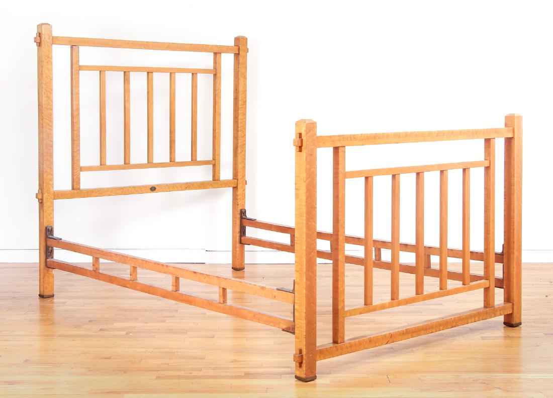 Arts & Crafts Full Wooden Bed: Arts & Crafts wooden slatted full bed, manufactured by Ariel Wood Bed Co., Chicago, signed with metal tag, headboard measures 57.5" x 56", footboard measures 39.5" x 56", each side slat measures 76.5"