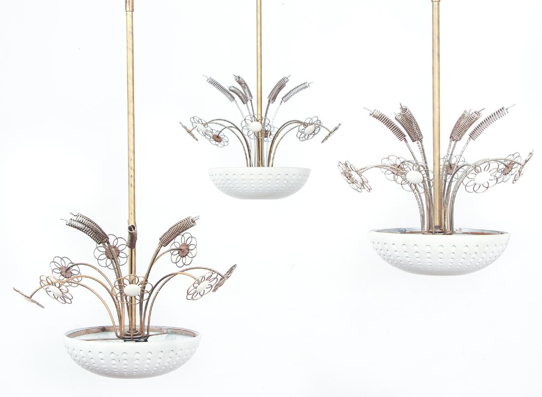 Three Paavo Tynell Light Pendants: Three Paavo Tynell light pendants for Lightolier, brass and metal painted white, two measuring 28 by 15 inches and one measuring 35 by 15 inches.