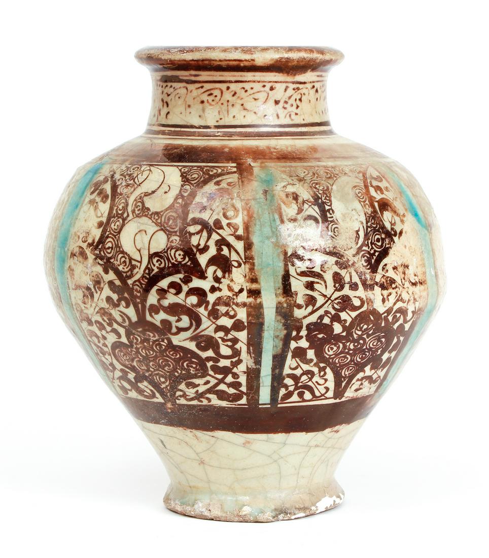 Antique Syrian or Persian Decorated Vase: Persian or Syrian glazed vase of a shouldered ovoid form painted with stylized brown flowers and vines divided by turquoise vertical stripes, 8.5 inches tall